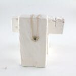 Gouden hanger à la Art Nouveau met Peridot